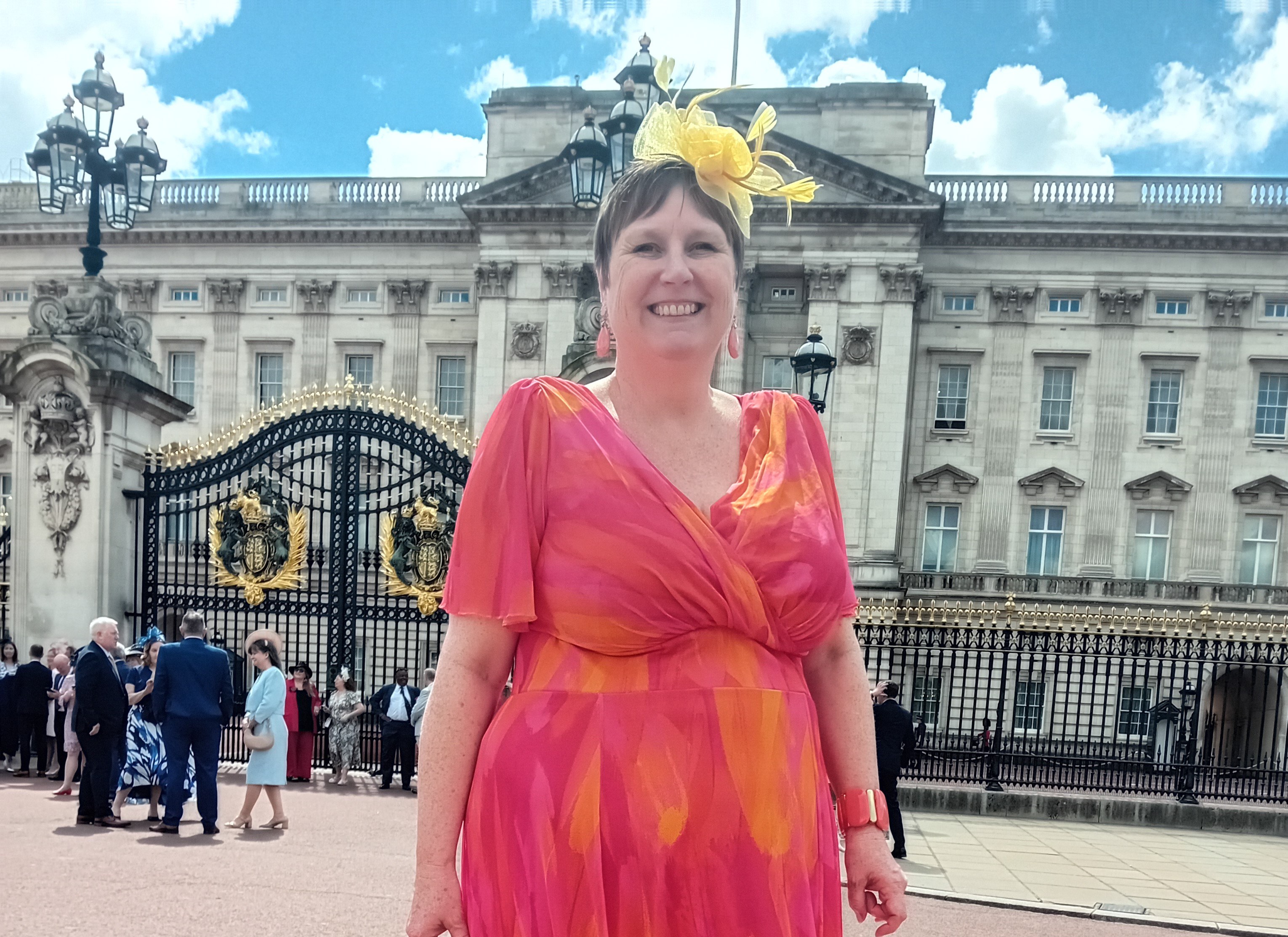 Director Zara Matthews in front of Buckingham Palace